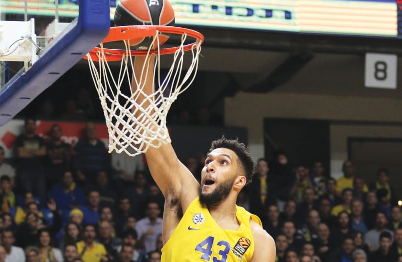 Maccabi Tel Av iv forward Jonah Bolden has been superb on the defensive end, but the shorthanded yellow-and-blue needs him to snap his sixgame streak of single-digit scoring against Real Madrid in Spain. (photo credit: ADI AVISHAI)
