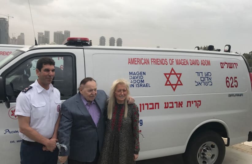 Sheldon and Miri Adelson at the dedication ceremony of new ambulances they donated to Magen David Adom. (photo credit: MAGEN DAVID ADOM)