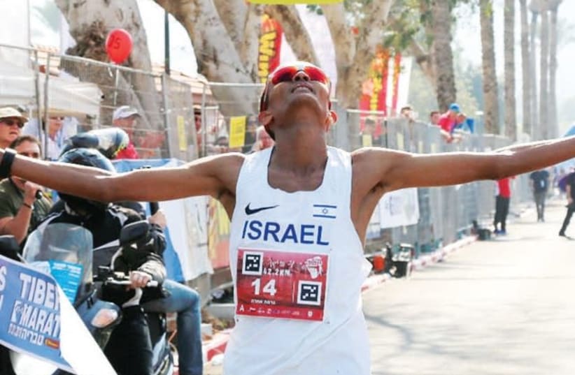 Israel’s Girmaw Amare won the Tiberias Marathon yesterday in a new personal best time of 2:15.30 hours. (photo credit: VIDEO BARAK/COURTESY)