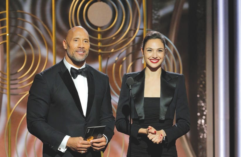 ISRAELI ACTRESS Gal Gadot – clad in black as part of the #Metoo theme – and her former ‘Fast and Furious’ co-star Dwayne ‘The Rock’ Johnson present at the 75th annual Golden Globes in Los Angeles. (photo credit: NBC/REUTERS)