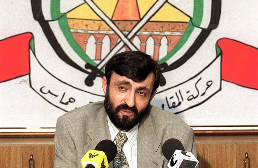 Imad al-Alami, talks to journalists at a press conference held in the southern suburbs of Beirut in 1999. (photo credit: JOSEPH BARRAK / AFP)