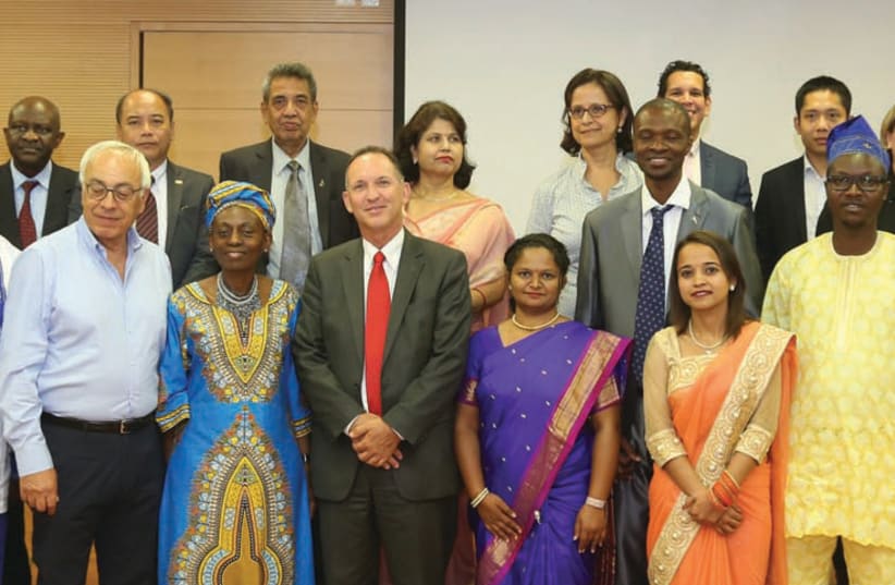 The ambassadors’ reception preceding the 2017 IMPH graduation in Jerusalem: In the center (in Kenyan national dress) is the keynote speaker, Commonwealth Deputy Secretary General Josephine Ojiambo (IMPH 1999), while Prof. Ora Paltiel, director of the IMPH, is fourth from the right (photo credit: SASSON TIRAM PHOTOGRAPHY / BRAUN SCHOOL)
