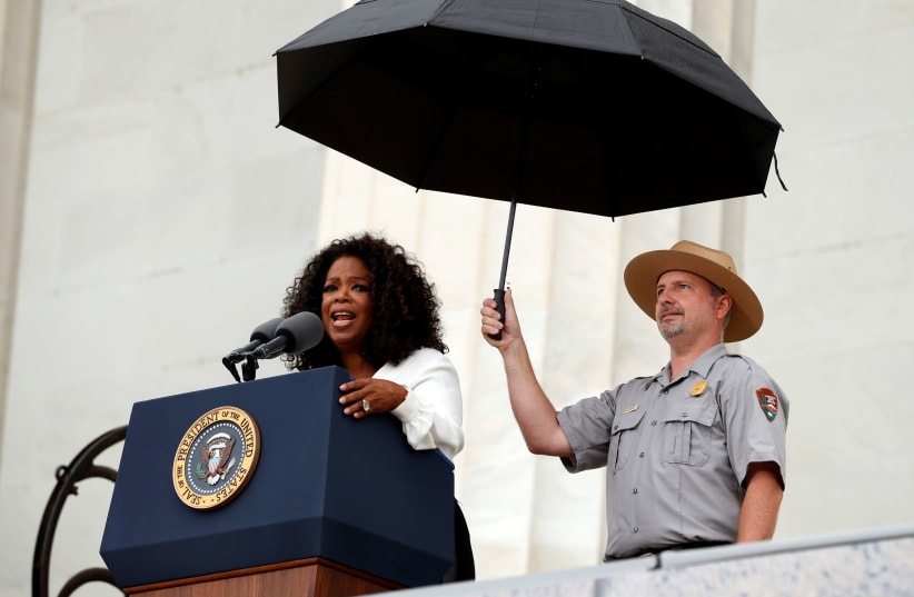 Oprah Winfrey speaks during the commemoration of the 50th anniversary of the March on Washington and Reverend Martin Luther King Jr.'s 'I have a dream' speech at the Lincoln Memorial in Washington, DC. (photo credit: REUTERS)