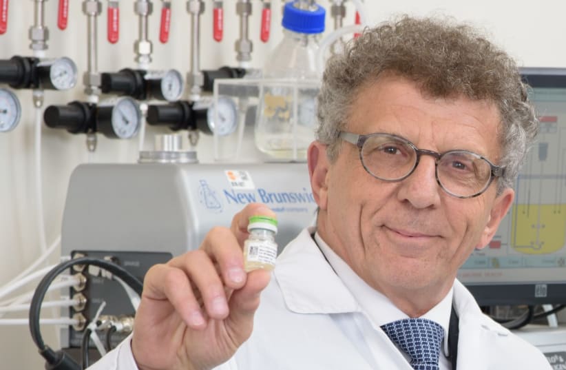 Pluristen chairman and co-CEO Zami Aberman holds a vial of specialized stem cells the company calls ‘the next generation of biological therapeutic products (photo credit: COURTESY PLURISTEM)