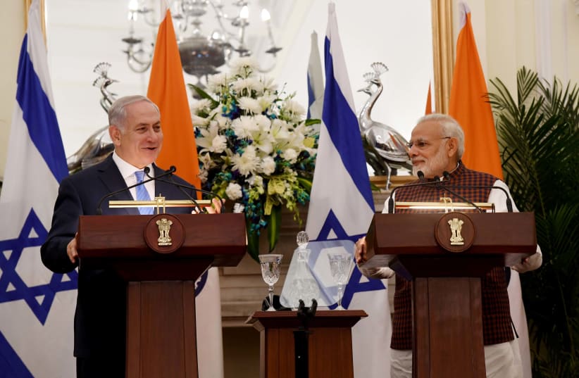 Israeli PM Netanyahu and Indian PM Narendra Modi speak at a press conference in New Delhi. (photo credit: AVI OHAYON - GPO)