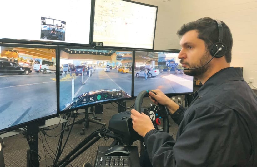 PHANTOM AUTO, one of the Israeli auto-tech companies at CES this year, displayed a system that allows an off-site tele-operator to drive an autonomous vehicle by ‘remote control.’ (photo credit: Courtesy)