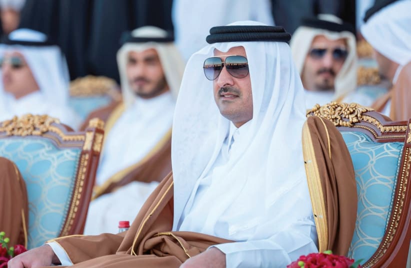 QATAR’S EMIR Sheikh Tamim bin Hamad al-Thani attends Qatar’s National Day celebrations in Doha in December. (photo credit: QATAR NEWS AGENCY/HANDOUT VIA REUTERS)