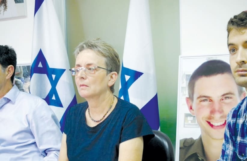 THE PARENTS and twin brother of IDF Lt. Hadar Goldin announce their intent to petition the High Court of Justice to force the government to do more to get Hamas to release the remains of their son. (Flash90) (photo credit: FLASH90)