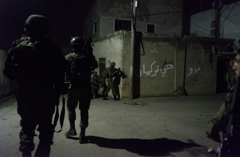 Israeli forces conduct an operation in Jenin overnight on Wednesday, January 17, 2018. (photo credit: IDF SPOKESPERSON'S UNIT)