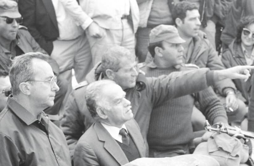 Yitzhak Shamir, prime minister during the 1991 Gulf War, is flanked by then-defense minister Moshe Arens (left) and an unidentified officer (photo credit: DEFENSE MINISTRY)