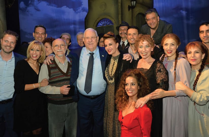 PRESIDENT REUVEN RIVLIN with the cast of ‘Bustan Sephardi,’ which was written by Israel’s fifth president, Yitzhak Navon. (Kobi Gideon/GPO) (photo credit: KOBI GIDEON/GPO)