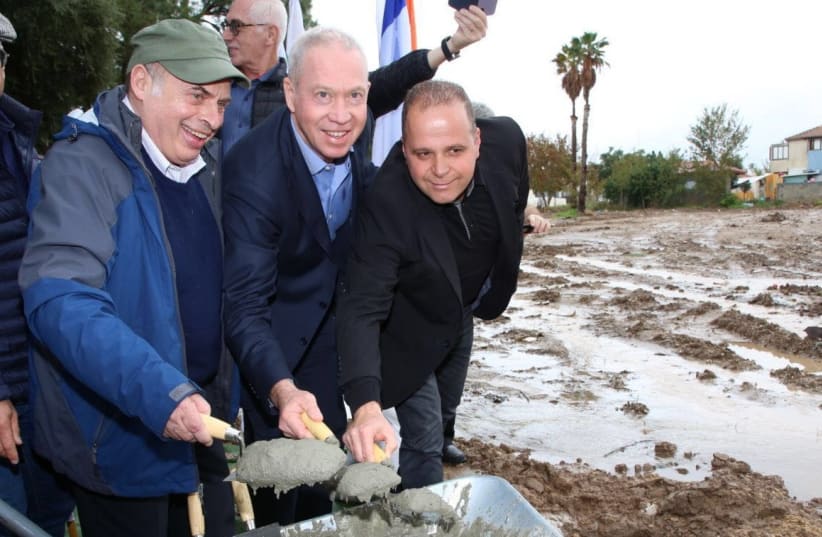 Jewish Agency Chairman Natan Sharansky, Minister of Construction and Housing Yoav Gallant, and acting Mayor of Ashkelon Tomer Glam lay the cornerstone of the largest-ever housing project for senior citizens ever constructed in Israel.  (Sasson Tiram for The Jewish Agency for Israel.) (photo credit: SASSON TIRAM FOR THE JEWISH AGENCY FOR ISRAEL)