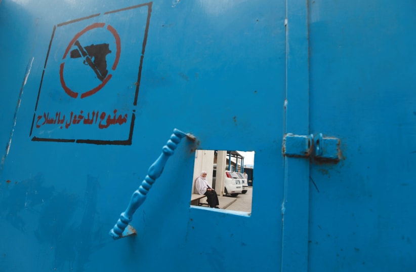 THE GATE of an UNRWA office in Gaza. (photo credit: REUTERS)