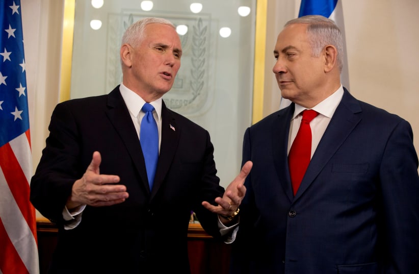 US Vice President Mike Pence speaks with Israeli Prime Minister Benjamin Netanyahu during a meeting at the Prime Minister's office in Jerusalem (photo credit: REUTERS/ARIEL SCHALIT/POOL)