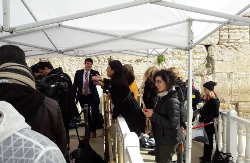 The Israeli press gathering at the Kotel moments before US Vice President Pence arrives. (photo credit: HERB KEINON)