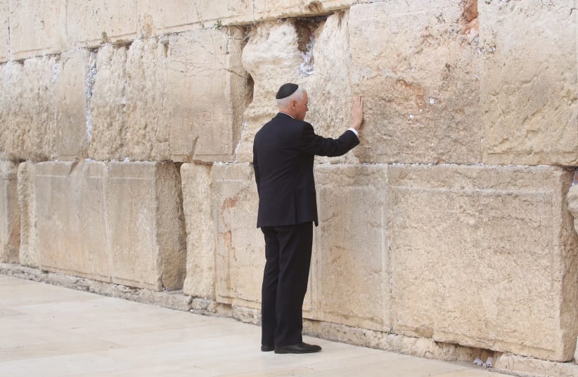 US Vice President Mike Pence prays at the Western Wall (photo credit: MARC ISRAEL SELLEM/THE JERUSALEM POST)