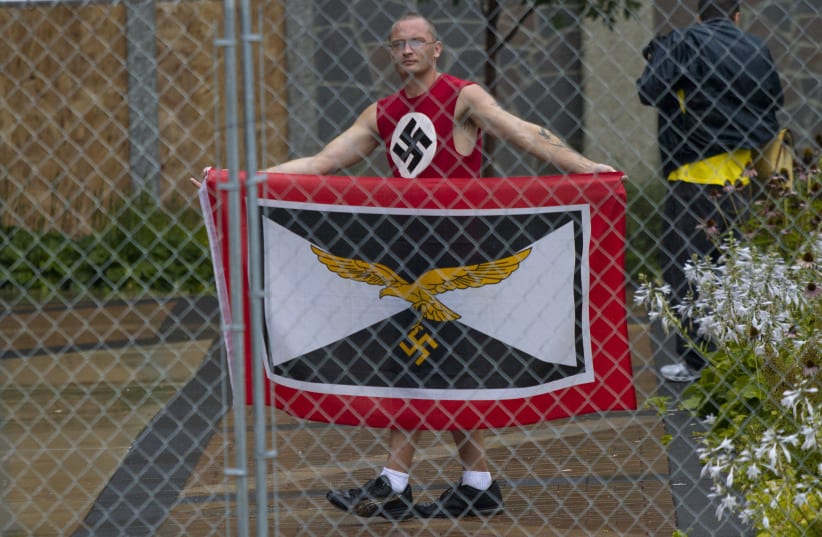 Members of White Supremacy groups gather in West Allis, Wisconsin. (photo credit: REUTERS)