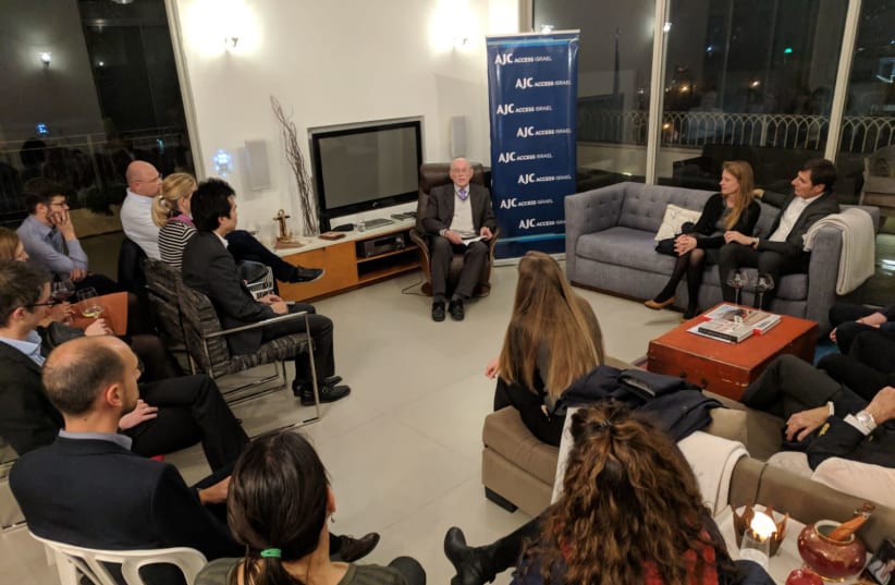 AJC ACCESS members and diplomats listen to Holocaust survivor Sylvian Brachfeld tell his story (photo credit: Courtesy)