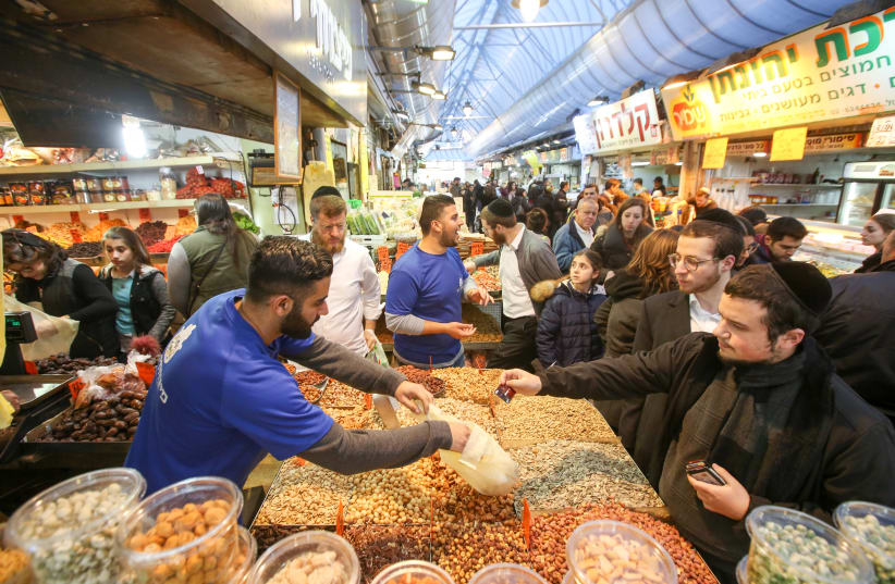 Tu Bishvat shopping at Jerusalem's Mahane Yehuda market (photo credit: MARC ISRAEL SELLEM/THE JERUSALEM POST)
