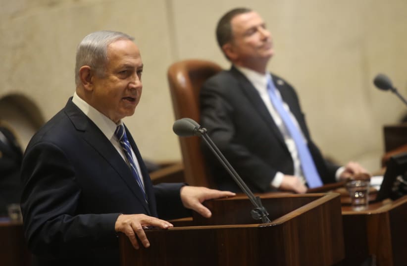Benjamin Netanyahu speaks to the Knesset, 31 January, 2018 (photo credit: MARC ISRAEL SELLEM)