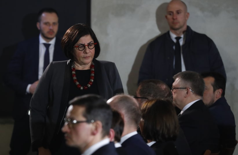 Ambassador of Israel to Poland Anna Azari attends a commemoration event in the so-called "Sauna" building at the former Nazi German concentration and extermination camp Auschwitz II-Birkenau, January 27, 2018 (photo credit: REUTERS/KACPER PEMPEL)