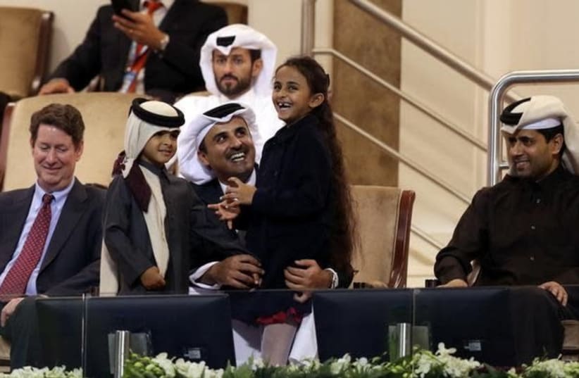   Emir of Qatar Sheikh Tamim bin Hamad Al Thani is seen during the match of France's Gael Monfils against Andrey Rublev of Russia (photo credit: REUTERS/IBRAHEEM AL OMARI)
