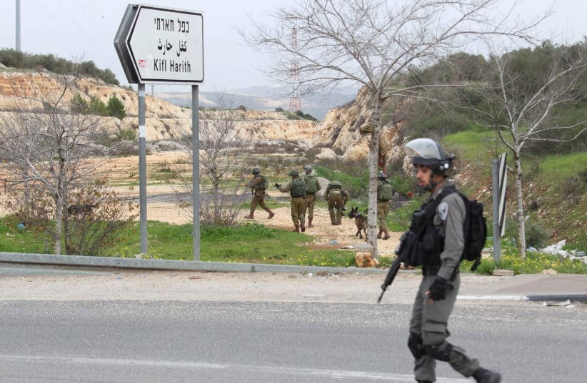 IDF soldiers searching the area after West Bank stabbing attack (photo credit: HILEL MEIR)