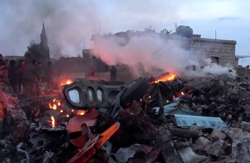 The aftermath of a Russian warplane shot down by Syrian rebels in Idlib, Syria (photo credit: REUTERS)
