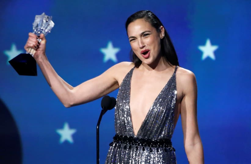 Actress Gal Gadot receives the 2018 #See Her award at the 23rd Critics’ Choice Awards for her performance in "Wonder Woman." (photo credit: REUTERS)