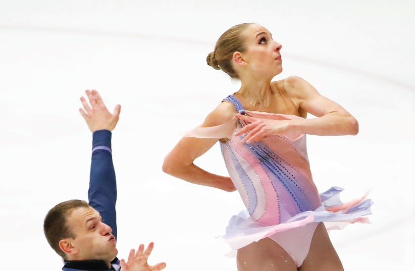 THE Israel figure skating duo of Evgeni Krasnopolski (left) and Paige Conners (right) will already begin their participation at the Pyeongchang Winter Games on Friday when they perform their short program as part of the team event. (photo credit: REUTERS)