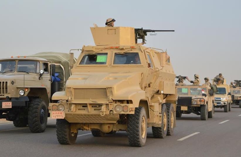 Egyptian Army's Armoured Vehicles are seen on a highway to North Sinai during a launch of a major assault against militants (photo credit: MINISTRY OF DEFENCE/HANDOUT VIA REUTERS)