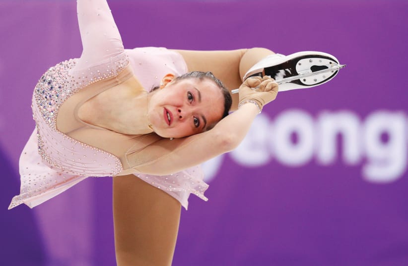 AIMEE BUCHANAN competes for Team Israel yesterday during the women’s short program in the figure skating team event. The 24-year-old – originally from the US – set a personal best with her performance, but that wasn’t enough to propel the blue-and-white into the medal round. (photo credit: REUTERS)