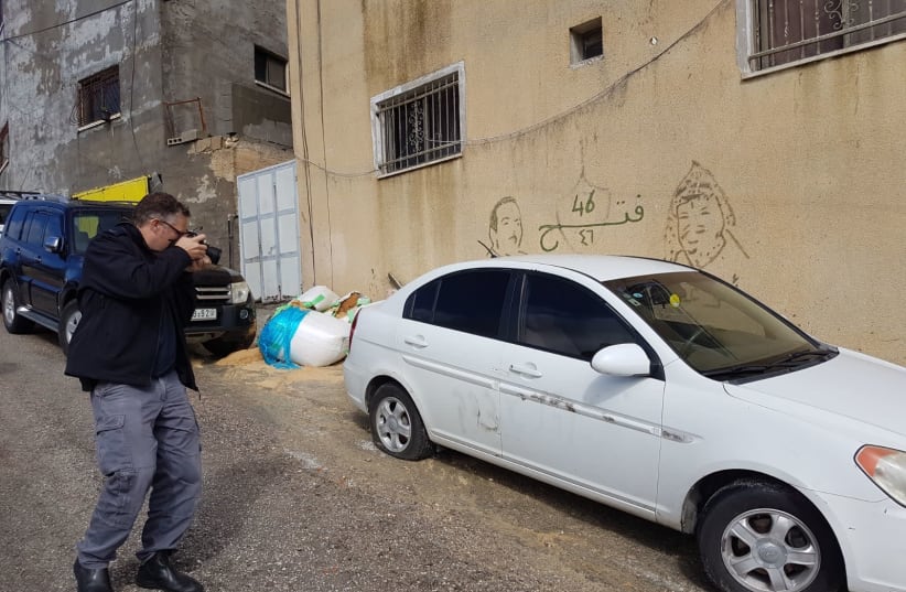 A car in Jit that was allegedly vandalized by settlers. (photo credit: ISRAEL POLICE)