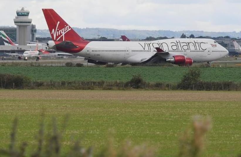A Virgin Atlantic passenger aircraft prepares for take off from Gatwick Airport in southern England, Britain, October 9, 2016. REUTERS/Toby Melville (photo credit: REUTERS/TOBY MELVILLE)