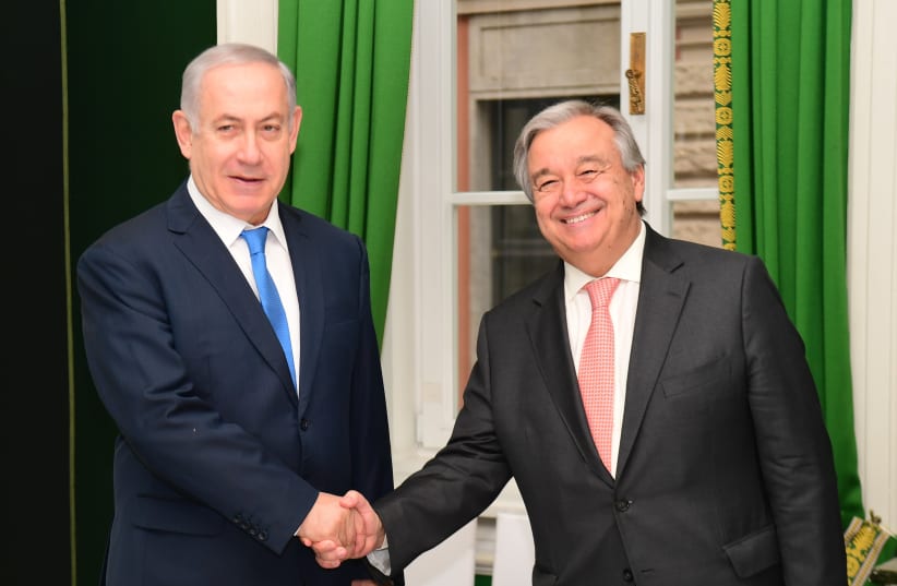 Prime Minister Benjamin Netanyahu meets United Nations Secretary-General in Munich, February 16, 2018 (photo credit: AMOS BEN GERSHOM, GPO)