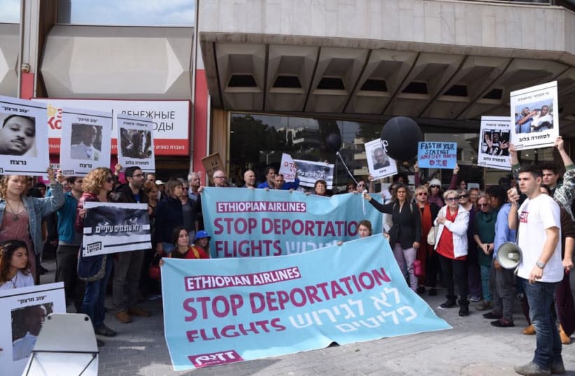 Anti-deportation activists gather at Ethiopian Airlines in Tel Aviv Monday to protest its role in deporting African migrants. (photo credit: ZAZIM COMMUNITY ACTION)