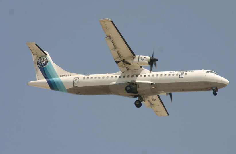 A twin-engined turboprop ATR-72 Aseman Airlines plane, that crashed in central Iran is seen in Dubai, United Arab Emirates (photo credit: COURTESY OF DAVID OSBORN/AEROPRINTS /VIA REUTERS)