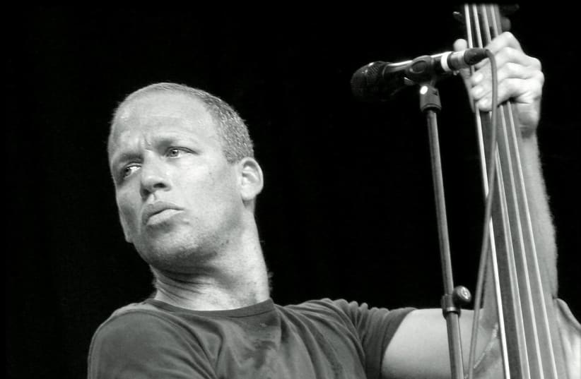 Israeli jazz bassist Avishai Cohen  (photo credit: GAUTHIER VANDEMOORTELE / WIKIMEDIA COMMONS)