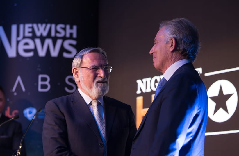 Former prime minister Tony Blair presents Lord Rabbi Jonathan Sacks with a Lifetime Achievement award at the Jewish News' Night of Heroes (photo credit: BLAKE EZRA PHOTOGRAPHY)