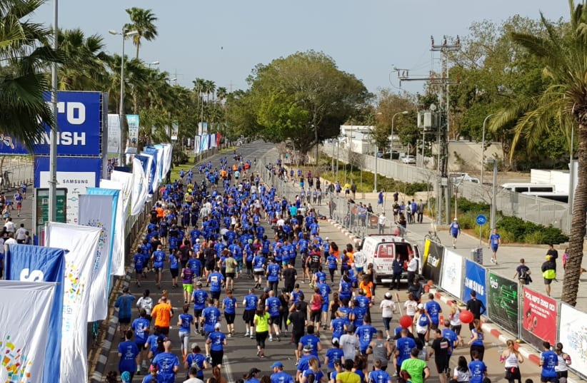 Runners at Tel Aviv's annual marathon, February 23, 2018 (Magen David Adom spokesperson) (photo credit: MAGEN DAVID ADOM)