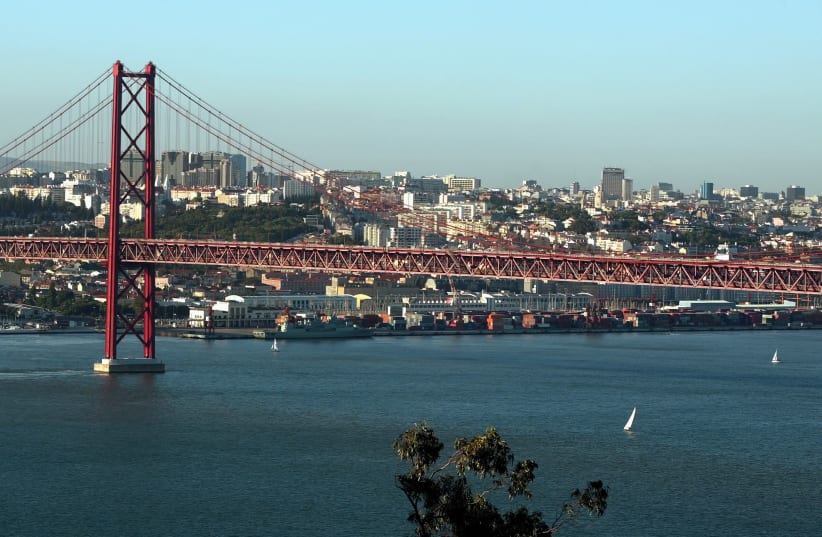 Overall view of the Tagus river bridge and the city of Lisbon, Portugal (photo credit: REUTERS)