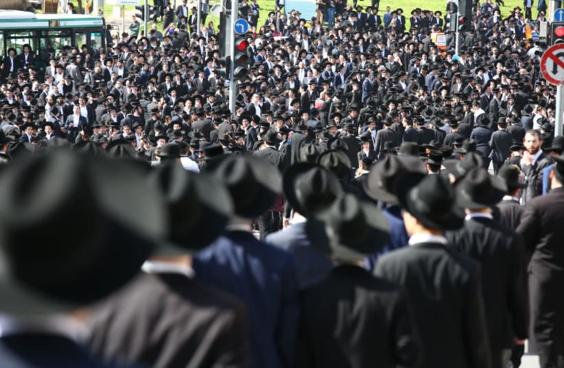 Haredi men gather in Jerusalem for the funeral of Rabbi Shmuel Auerbach  (photo credit: EHUD AMITON/TPS)