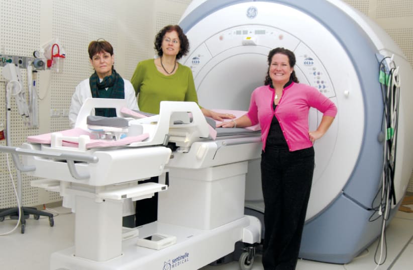 DR. MIRIAM SKLAR (center), head of breast imaging at the Meirav Breast Center and Rachel Moskovitch (right), seen with the department’s latest technology (photo credit: Courtesy)