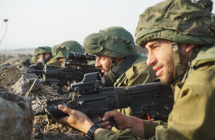 IDF soldiers take part in battlefield maneuvers in preparation with potential war in the north. (photo credit: IDF)