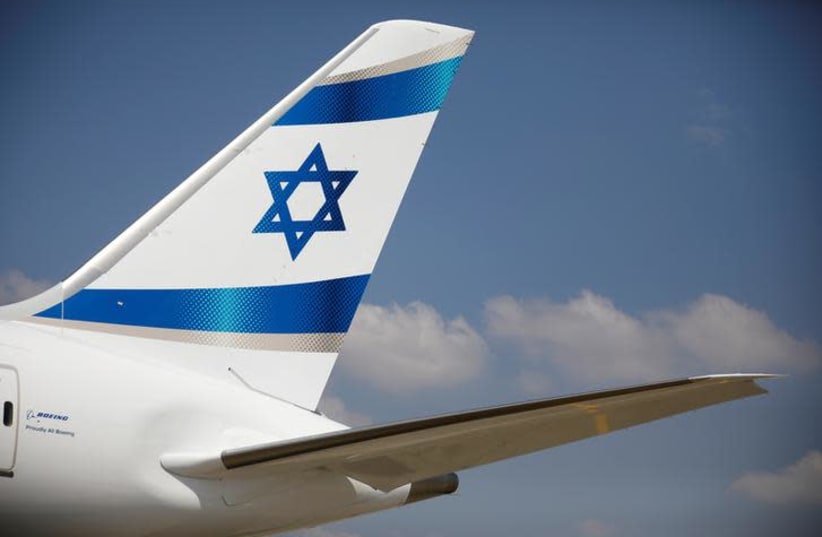 An Israeli flag is seen on the first of Israel's El Al Airlines order of 16 Boeing 787 Dreamliner jets, as it lands at Ben Gurion International Airport, near Tel Aviv, Israel August 23, 2017. REUTERS/Amir Cohen (photo credit: REUTERS/AMIR COHEN)