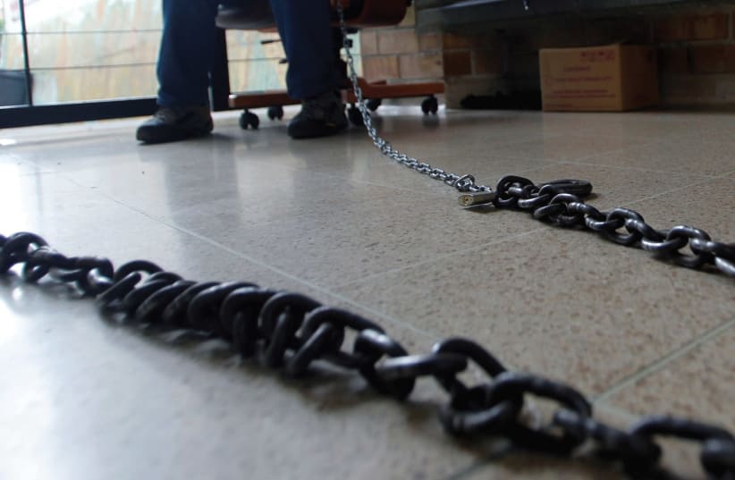 A chain, symbolic of women chained to marriage (photo credit: REUTERS)
