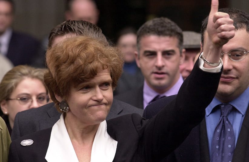 US academic Deborah Lipstadt (C) exults 11 April 2000 the High Court in London after winning a libel case brought against her and Penguin publications by British revisionist historian David Irving. (photo credit: MARTIN HAYHOW / AFP)