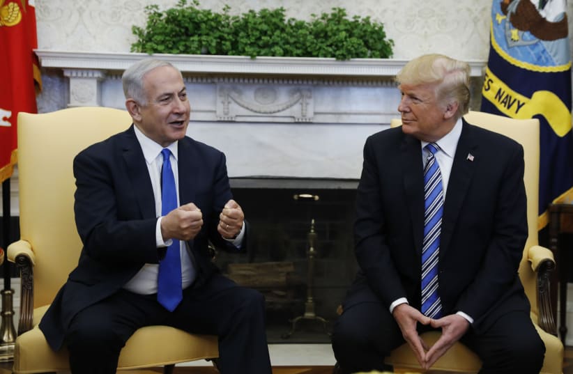  US president Donald Trump said he may come to Jerusalem in May for the formal move of the embassy to Jerusalem.  (photo credit: KEVIN LAMARQUE/REUTERS)