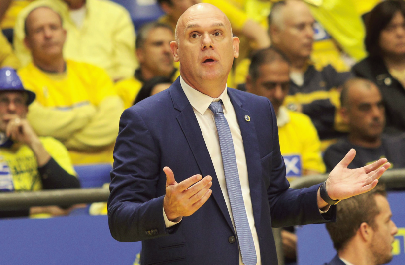 Maccabi Tel Aviv coach Neven Spahija will need to find answers for his team’s recent struggles very soon or the yellow-and-blue will be facing another lost season (photo credit: ADI AVISHAI)
