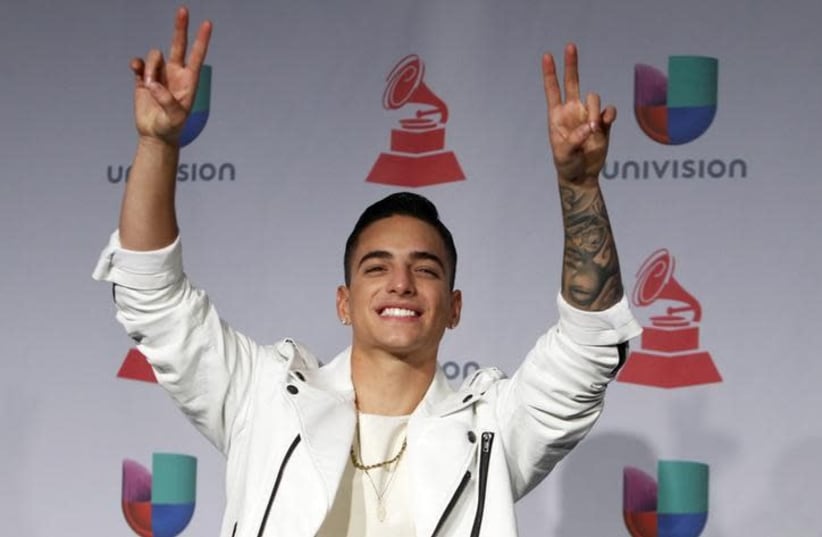 Maluma poses backstage during the 14th Latin Grammy Awards in Las Vegas, Nevada November 21, 2013 (photo credit: STEVE MARCUS/REUTERS)